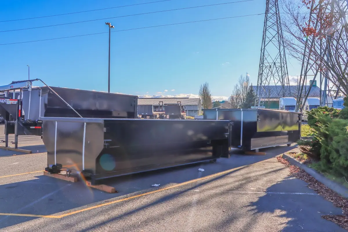 Roll-off dumpster ready for waste disposal at job site for 8 Yard Dumpster Rental in Troy